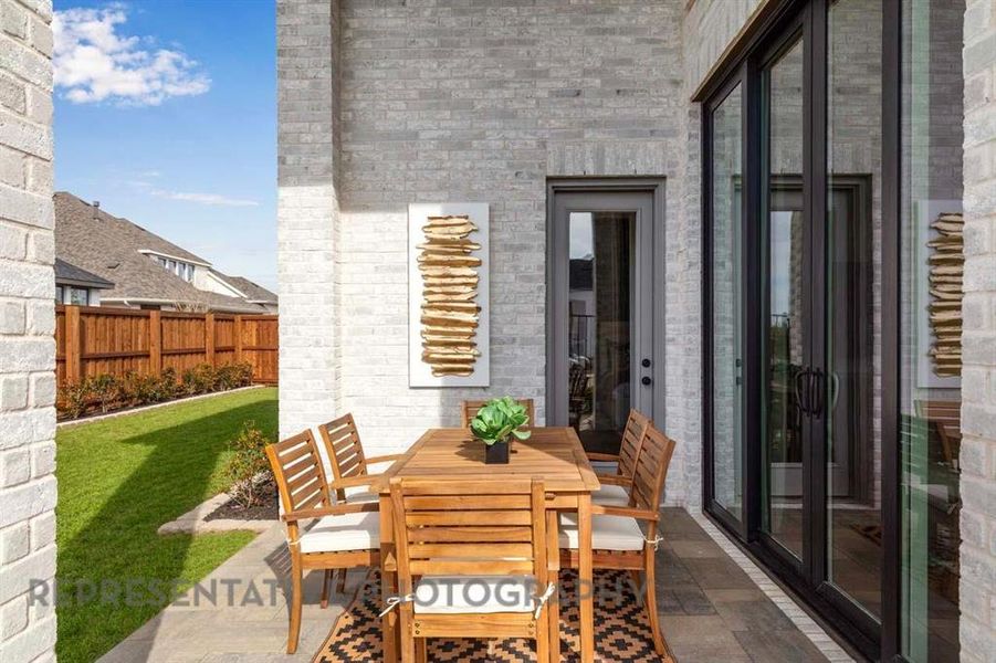 Exterior details and patio area of a home in Star Trail, Prosper (Image 19).