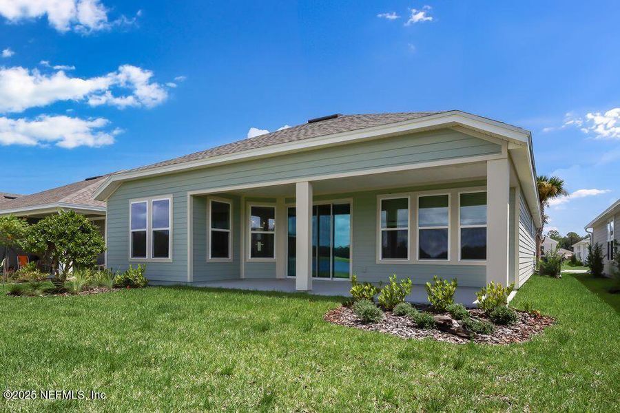Front exterior of a new home in Colbert Landings, Palm Coast, FL, highlighting curb appeal (Image 20).