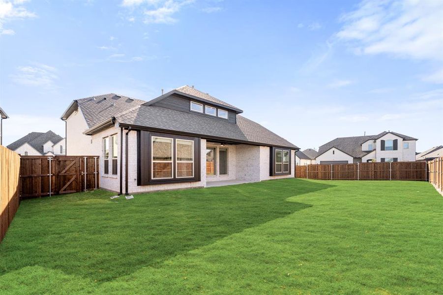 Exterior details and patio area of a home in Devonshire Classic 60-65, Forney (Image 3). Exterior details and patio area of a home in Devonshire Classic 60-65, Forney (Image 3).