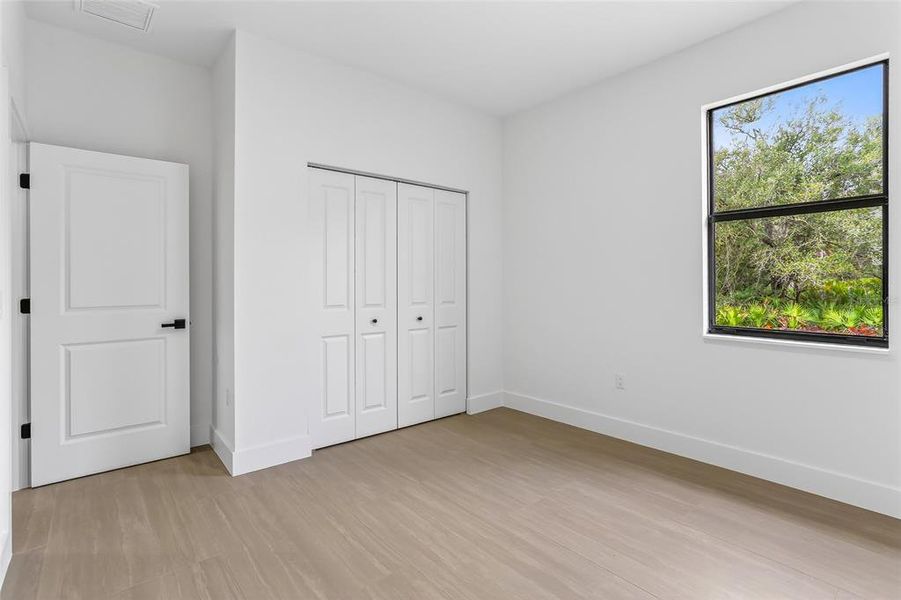 Spacious, unfurnished interior of a new home in , Port Charlotte (Image 40).
