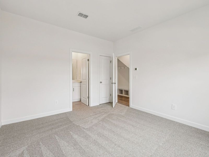 Spacious, unfurnished interior of a new home in Meadows at Wilson Farms - The Heights Series, Fort Mill (Image 18). Spacious, unfurnished interior of a new home in Meadows at Wilson Farms - The Heights Series, Fort Mill (Image 18).