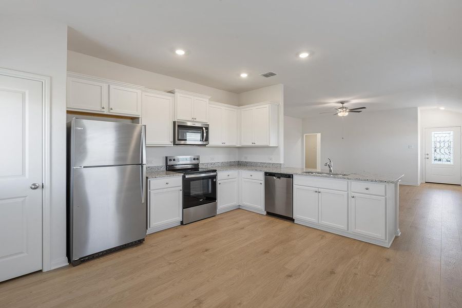 Furnished interior view inside a new home in Canyon Ranch, Jarrell (Image 3). Furnished interior view inside a new home in Canyon Ranch, Jarrell (Image 3).