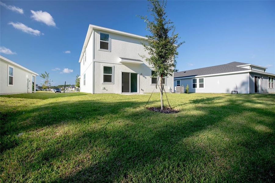 Exterior details and patio area of a home in Flagler Village - Classic Series, Palm Coast (Image 3).