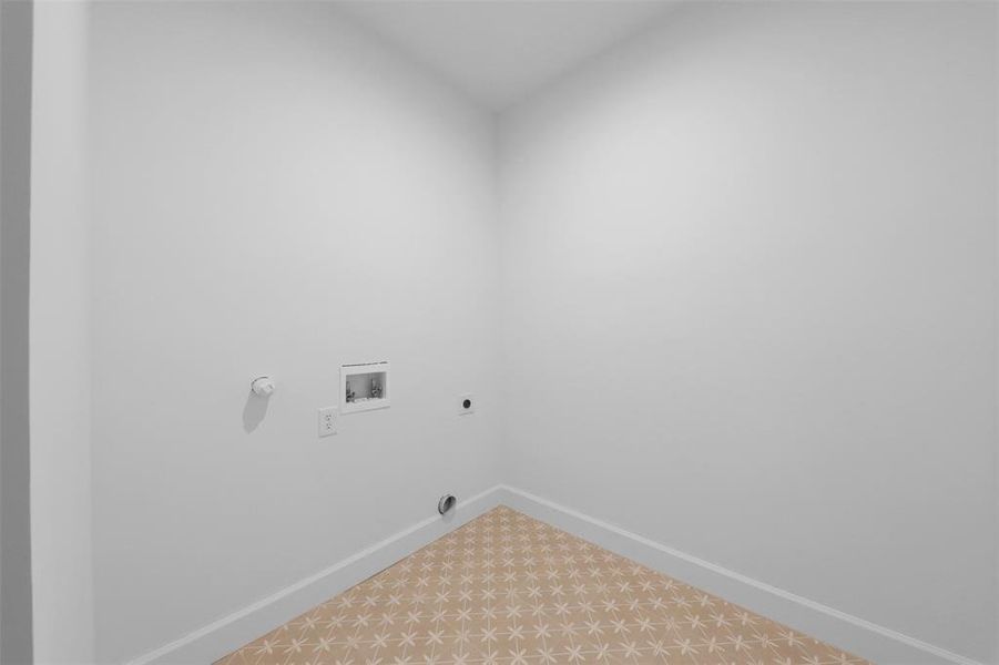 Washroom with washer hookup and electric dryer hookup