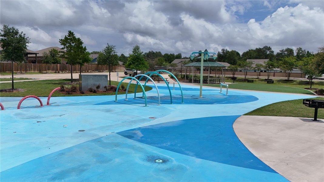 The kids will stay cool on hot summer days on the neighborhood splash pad. The kids will stay cool on hot summer days on the neighborhood splash pad.
