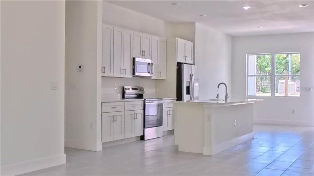 Furnished interior view inside a new home in , Dunnellon (Image 5).