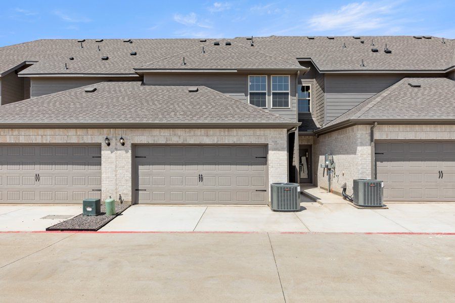 Front exterior of a new home in Sanger Circle, Sanger, TX, highlighting curb appeal (Image 19). Front exterior of a new home in Sanger Circle, Sanger, TX, highlighting curb appeal (Image 19).