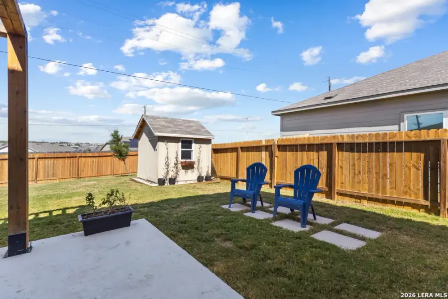 Exterior details and patio area of a home in Legend Pond, New Braunfels (Image 33).