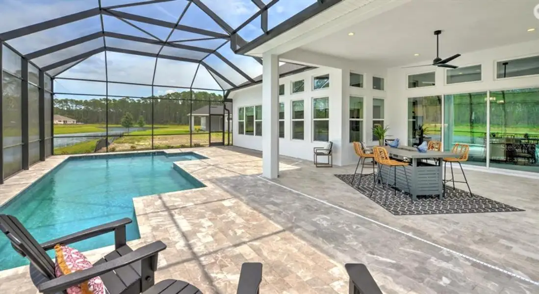 Exterior details and patio area of a home in Westlake Single Family, Ormond Beach (Image 2).