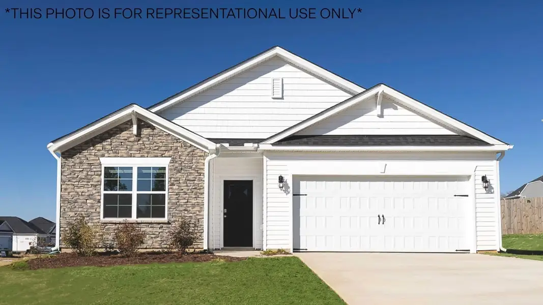 Front exterior of a new home in Bedford Place, Wilson, NC, highlighting curb appeal (Image 1). Front exterior of a new home in Bedford Place, Wilson, NC, highlighting curb appeal (Image 1).