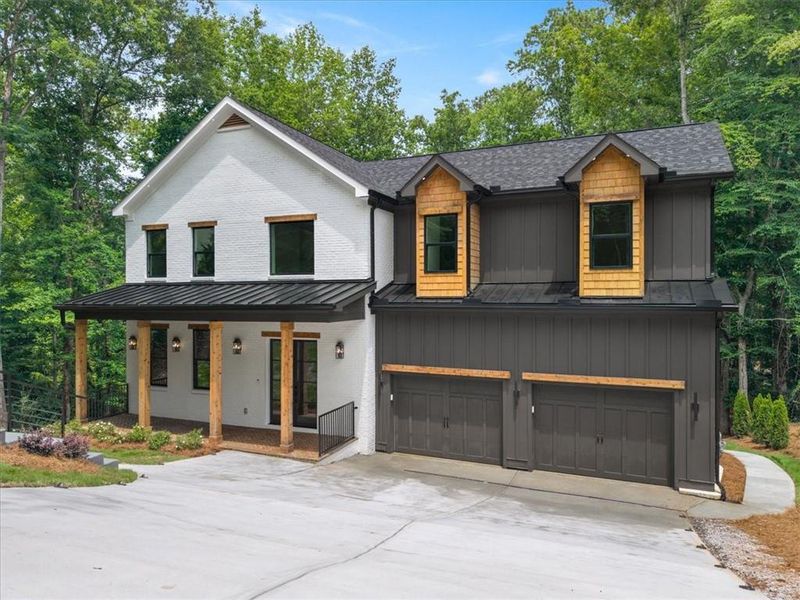 Front exterior of a new home in , Marietta, GA, highlighting curb appeal (Image 2). Front exterior of a new home in , Marietta, GA, highlighting curb appeal (Image 2).