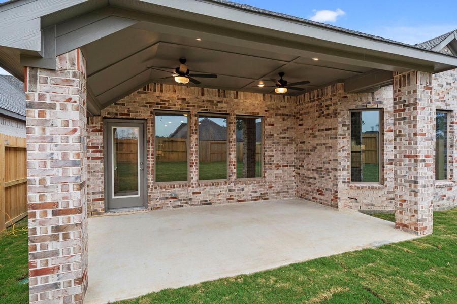 Exterior details and patio area of a home in The Highlands, Porter (Image 25).