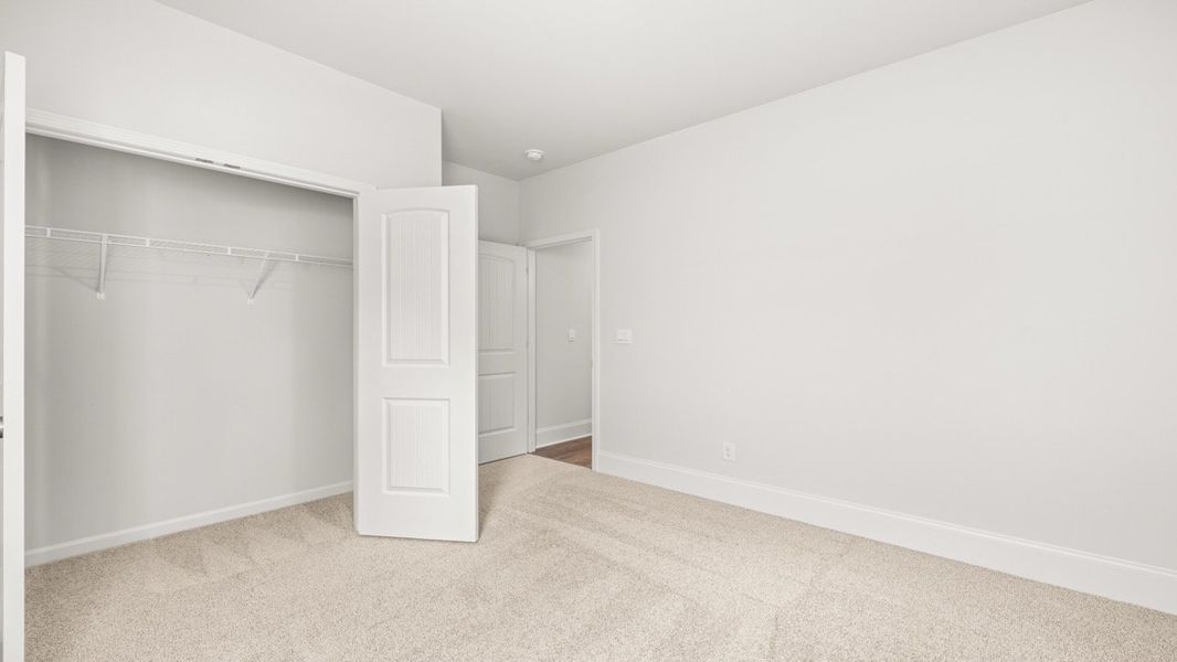 Representative unfurnished interior of a home built from the GRAYSON by D.R. Horton in Butner Estates, South Fulton (Image 29).