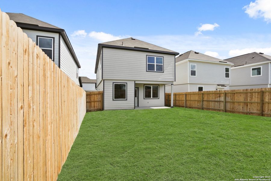 Exterior details and patio area of a home in Melissa Ranch, San Antonio (Image 3).