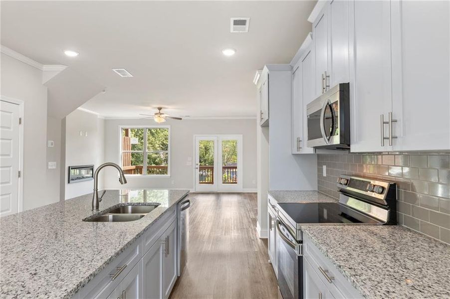 Furnished interior view inside a new home in Towns at Enclave, Lawrenceville (Image 5).