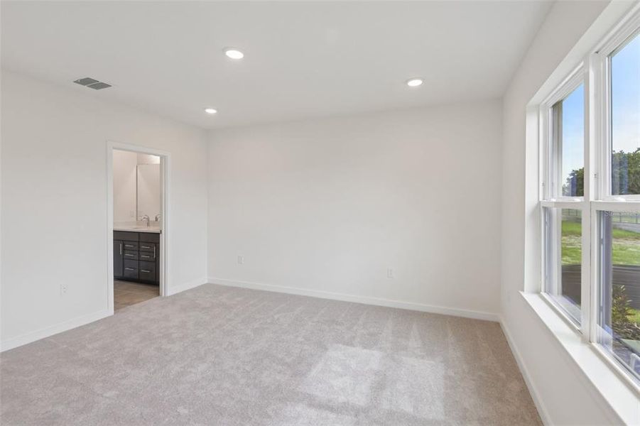 Spacious, unfurnished interior of a new home in Grasslands West, Lakeland (Image 14).