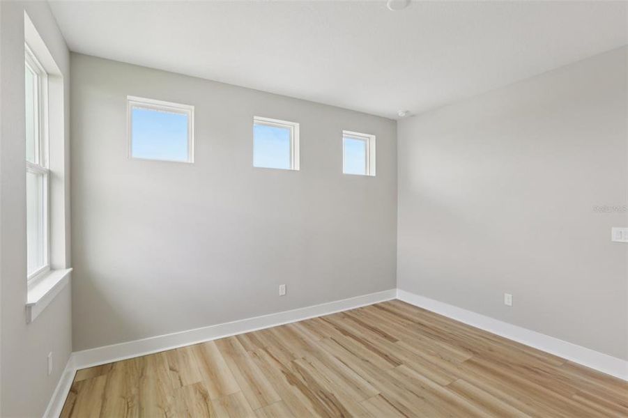 Spacious, unfurnished interior of a new home in Lagoon Residences at Epperson, Wesley Chapel (Image 18).