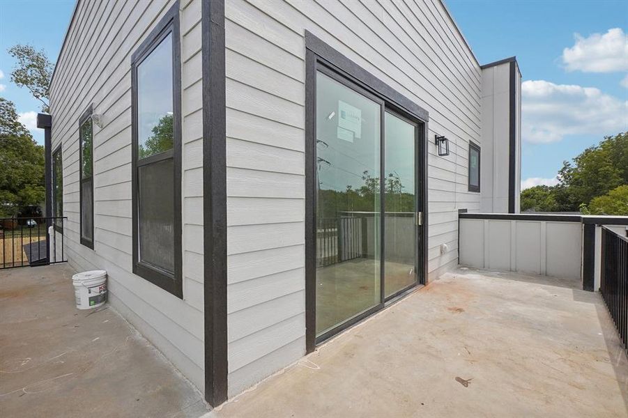 View of property exterior with a patio area