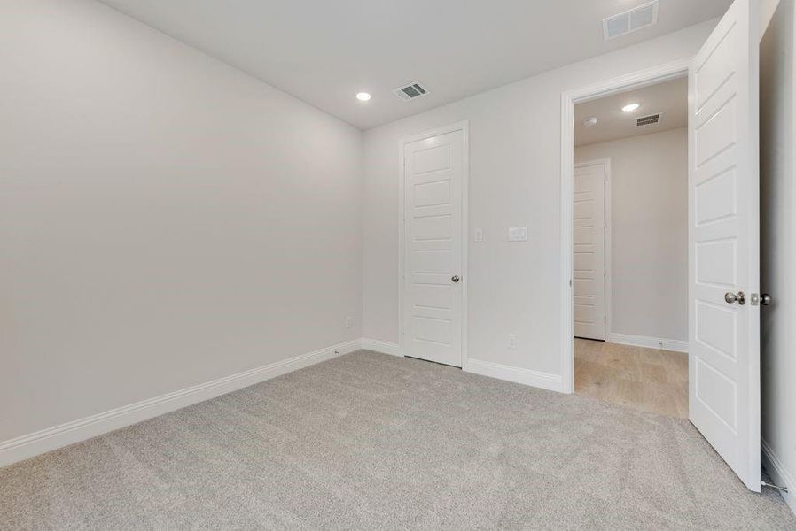 Spacious, unfurnished interior of a new home in Valencia On The Lake, Little Elm (Image 32).