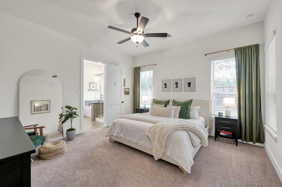 Serene primary suite retreat with generous space and elegant touches.