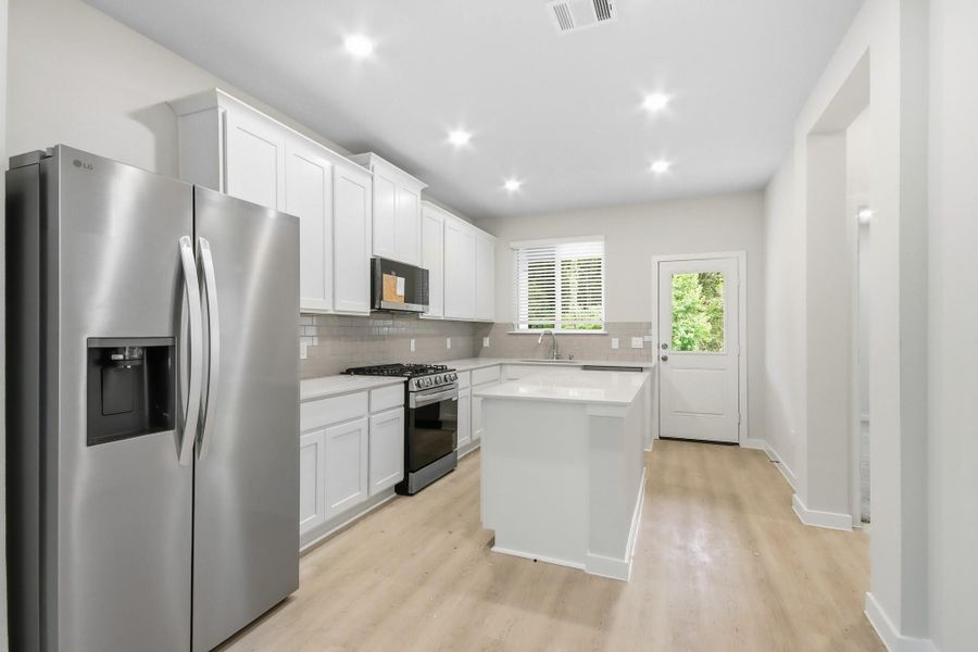 Furnished interior view inside a new home in Audubon, Magnolia (Image 7).