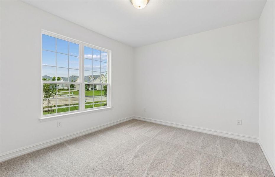 Secondary bedroom with large window
