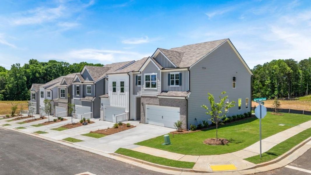 Front exterior of a new home in Village at Pine Valley, Gainesville, GA, highlighting curb appeal (Image 2). Front exterior of a new home in Village at Pine Valley, Gainesville, GA, highlighting curb appeal (Image 2).