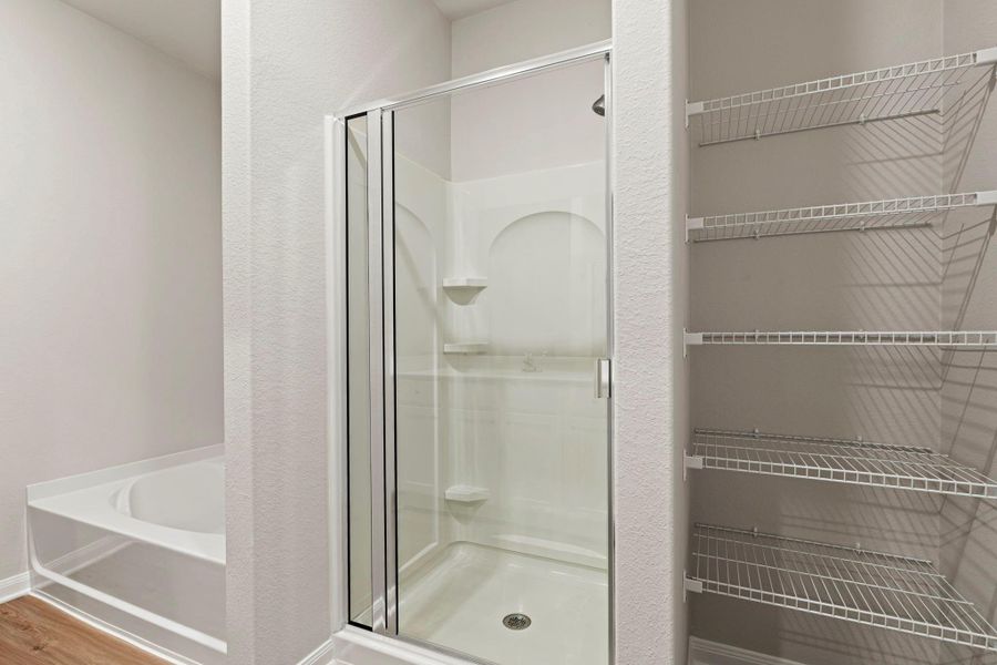 Furnished interior view inside a new home in Canterra Creek, Iowa Colony (Image 6).