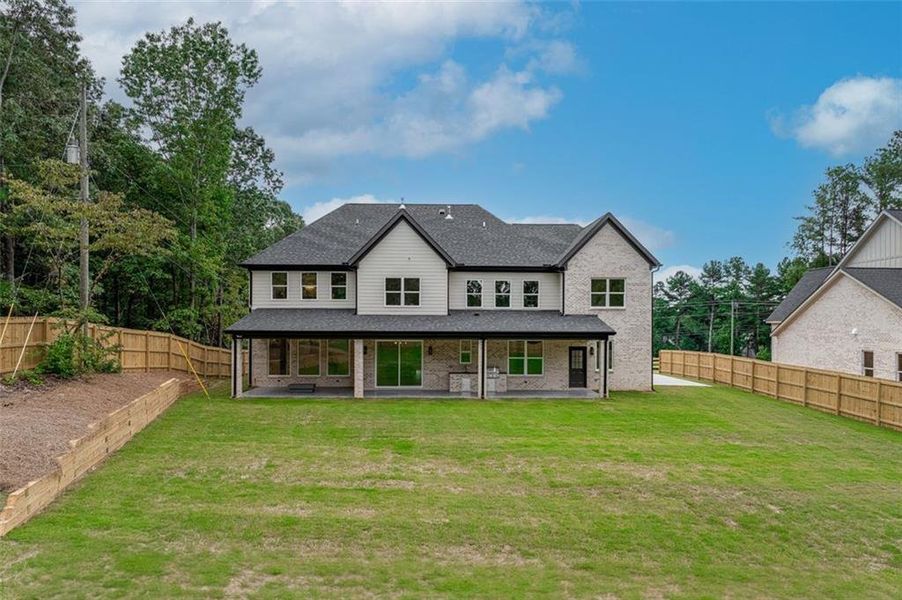 Front exterior of a new home in , Dacula, GA, highlighting curb appeal (Image 27).