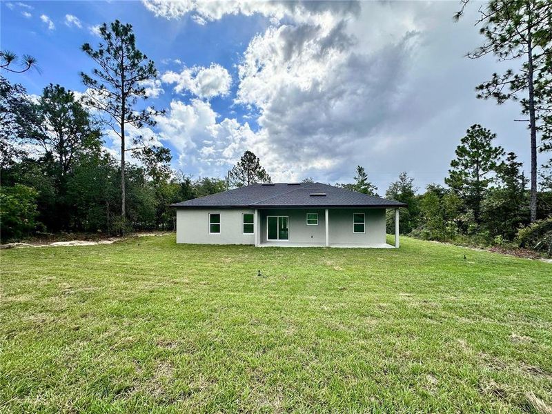 Front exterior of a new home in , Citrus Springs, FL, highlighting curb appeal (Image 18).