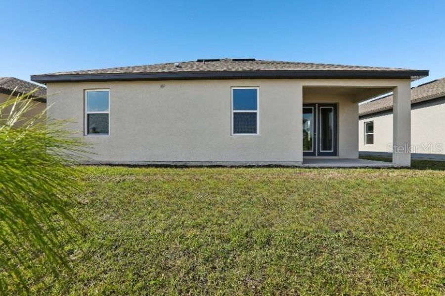 Exterior details and patio area of a home in Hawks Run, Kissimmee (Image 18). Exterior details and patio area of a home in Hawks Run, Kissimmee (Image 18).