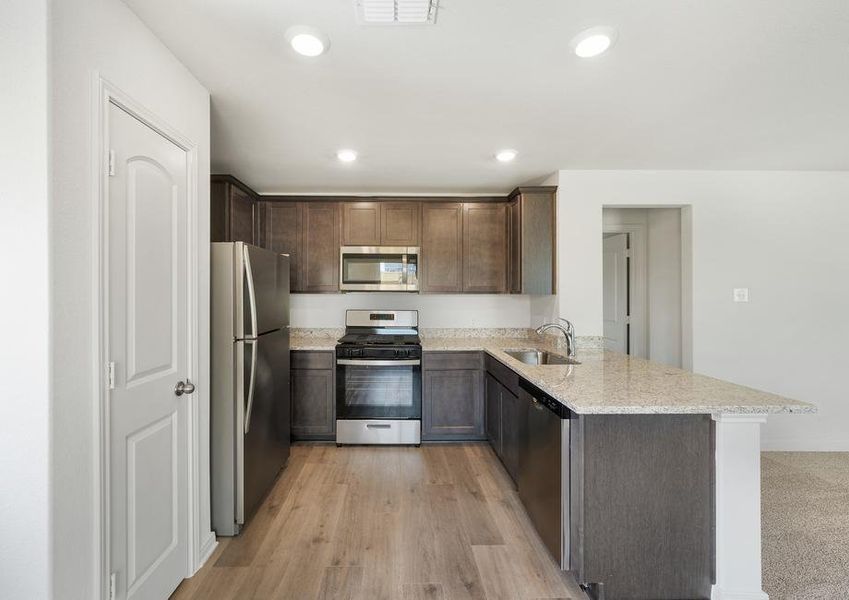 The kitchen has energy efficient appliances.