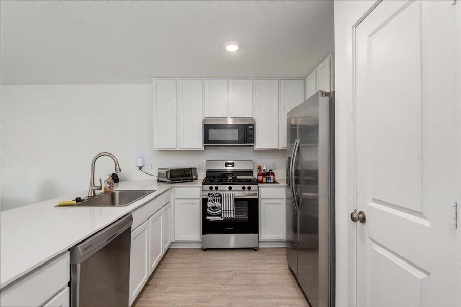 Furnished interior view inside a new home in Tavola, New Caney (Image 12).