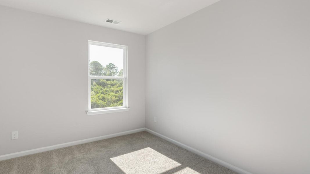 Spacious, unfurnished interior of a new home in The Landing at Sidbury Station, Castle Hayne (Image 26).