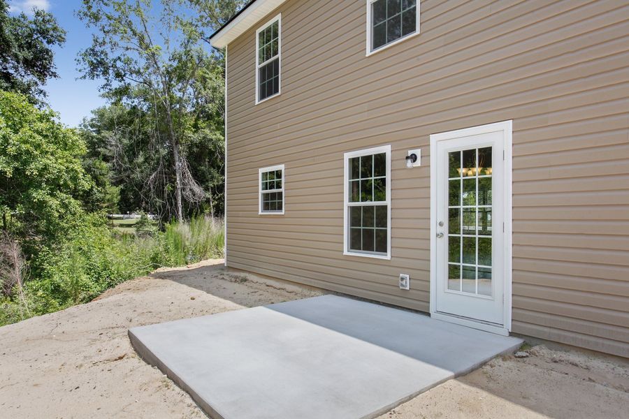 Representative exterior photo of a completed home built from the The Pamona by RTS Homes in Grand Reserve, Hinesville, GA (Image 19).