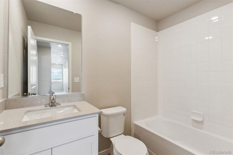 Furnished interior view inside a new home in Bennett Ranch, Bennett (Image 6).