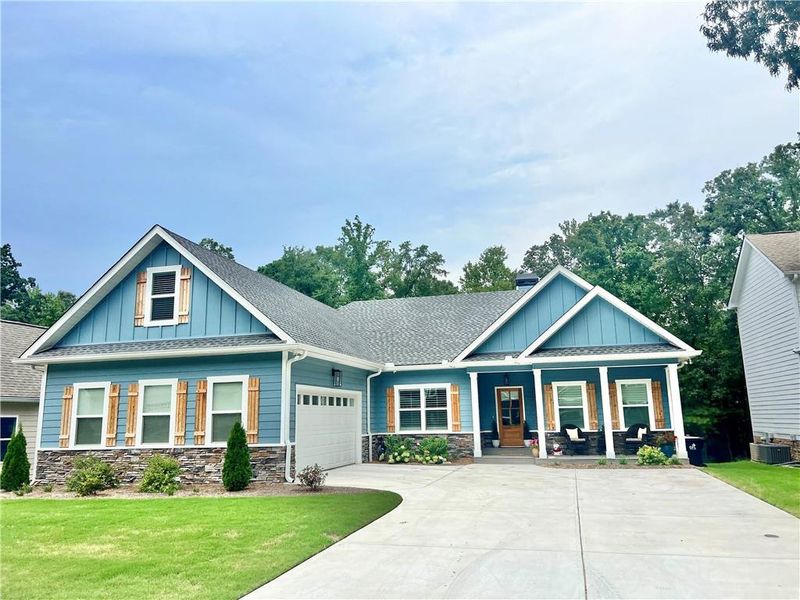 Front exterior of a new home in , Temple, GA, highlighting curb appeal (Image 1). Front exterior of a new home in , Temple, GA, highlighting curb appeal (Image 1).