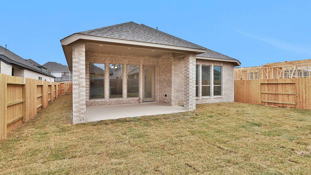 Exterior details and patio area of a home in Marvida, Cypress (Image 4).