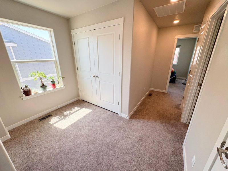 Spacious, unfurnished interior of a new home in Fickel Farm, Berthoud (Image 13).
