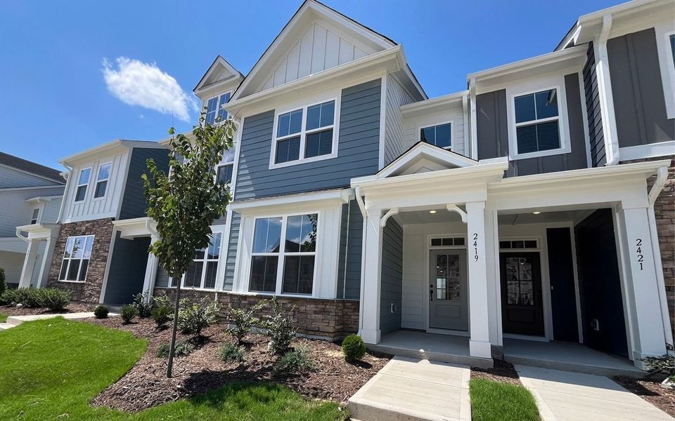 Front exterior of a new home in Wendell Falls, Wendell, NC, highlighting curb appeal (Image 22). Front exterior of a new home in Wendell Falls, Wendell, NC, highlighting curb appeal (Image 22).