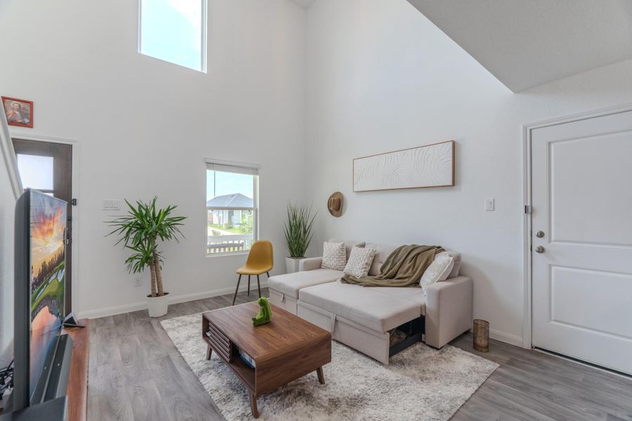 Open-concept layout flows from living to kitchen and dining areas Open-concept layout flows from living to kitchen and dining areas