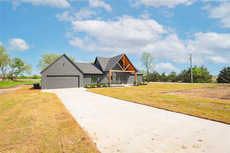 Front exterior of a new home in , Celeste, TX, highlighting curb appeal (Image 22).