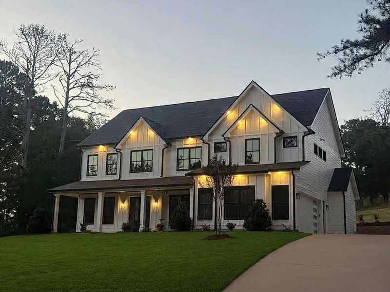 Front exterior of a new home in , Monroe, GA, highlighting curb appeal (Image 27).