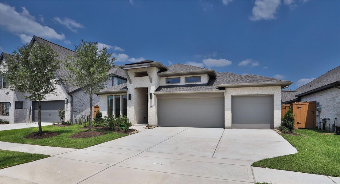 Front exterior of a new home in Marvida 55' - Gated, Cypress, TX, highlighting curb appeal (Image 1).