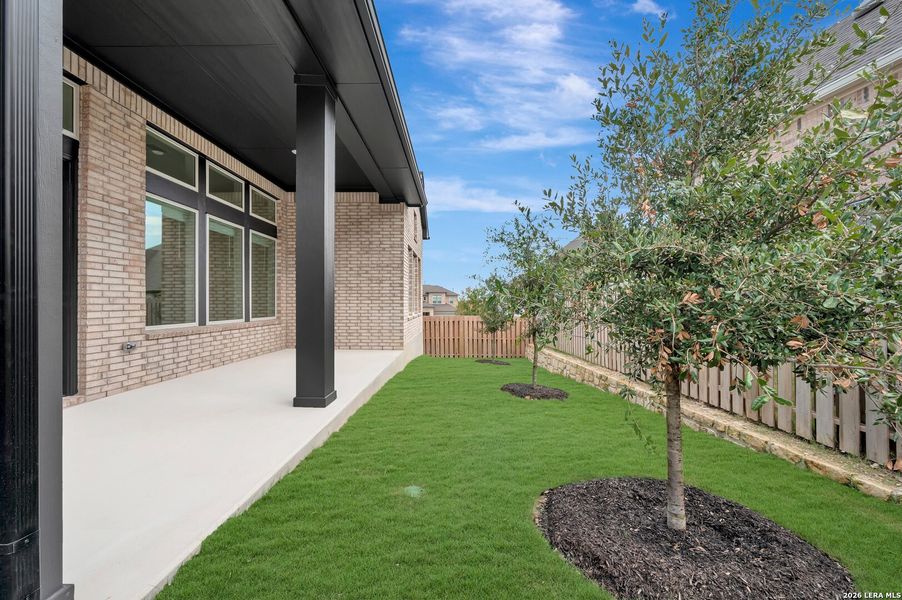 Exterior details and patio area of a home in Windsong - Reserve Series, Boerne (Image 24). Exterior details and patio area of a home in Windsong - Reserve Series, Boerne (Image 24).
