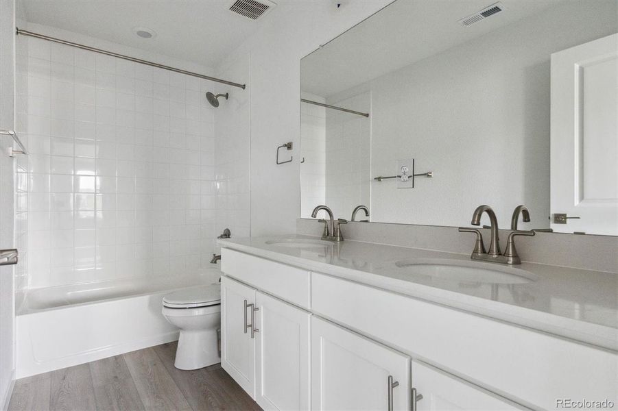 Furnished interior view inside a new home in Harvest Crossing, Aurora (Image 7).