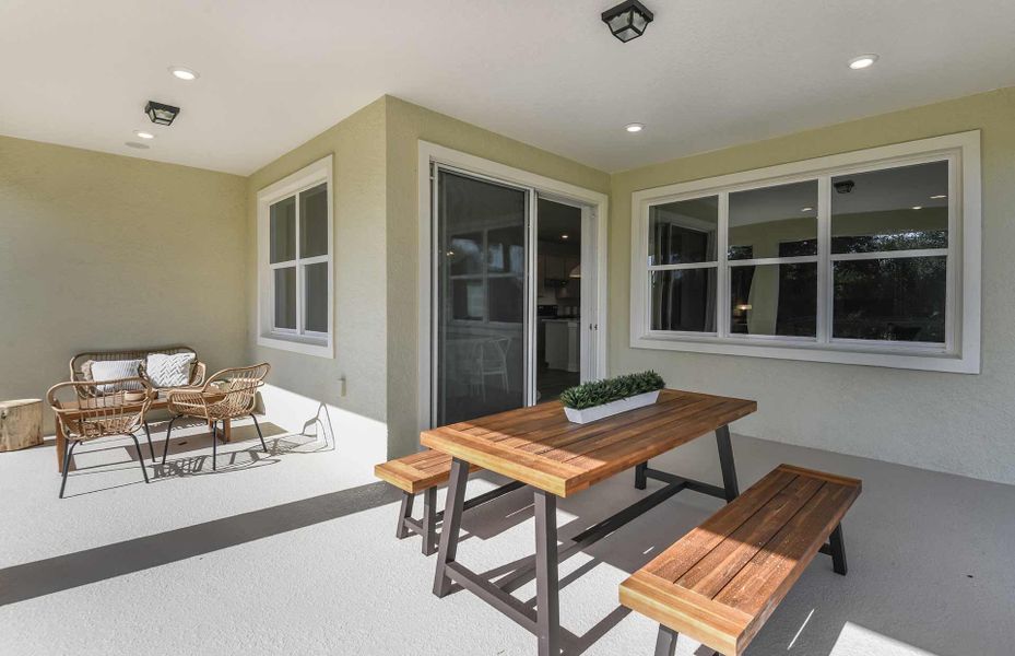 Exterior details and patio area of a home in Longmeadow at North River Ranch, Parrish (Image 2). Exterior details and patio area of a home in Longmeadow at North River Ranch, Parrish (Image 2).