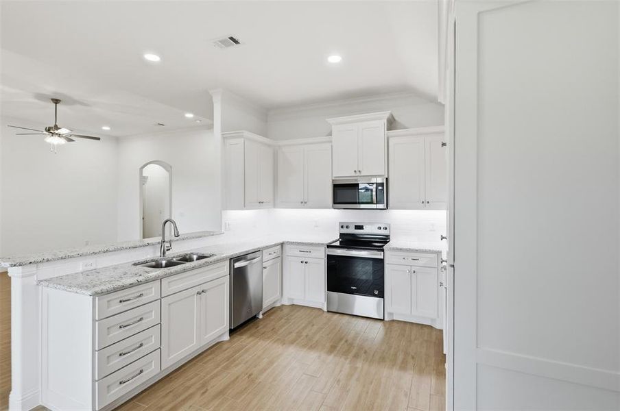 Furnished interior view inside a new home in , Tolar (Image 9).