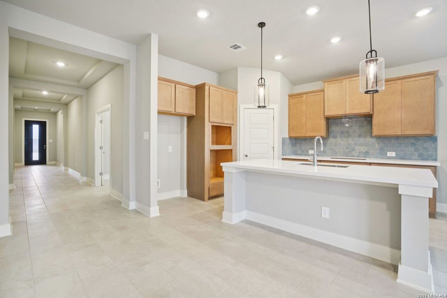 Furnished interior view inside a new home in Estancia Ranch - Classic Series, San Antonio (Image 14).