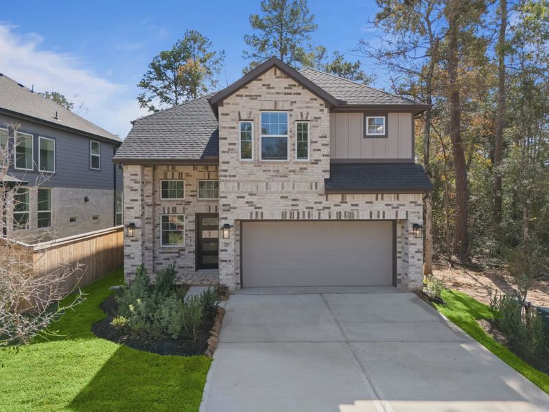 Representative exterior photo of a completed home built from the San Francisco by Chesmar Homes in The Woodlands Hills, Willis, TX (Image 1). Representative exterior photo of a completed home built from the San Francisco by Chesmar Homes in The Woodlands Hills, Willis, TX (Image 1).